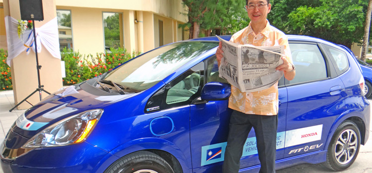 Honda Chairman Fumihiko Ike with one of the solar energy test vehicles. Photo: Hilary Hosia Honda chooses RMI for tests