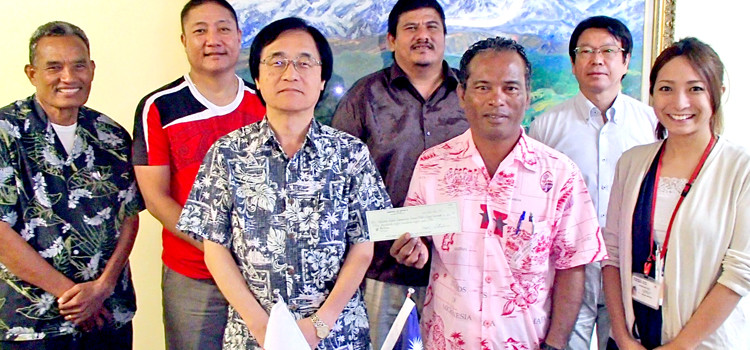 Ruthiran Lokeijak of PSS, Rongelap Mayor James Matayoshi, Ambassador Hideyuki Mitsuoka, Cassiano Jetnil of PSS, Principal Shiro Emejwa, and the Embassy Mejatto to get new classrooms