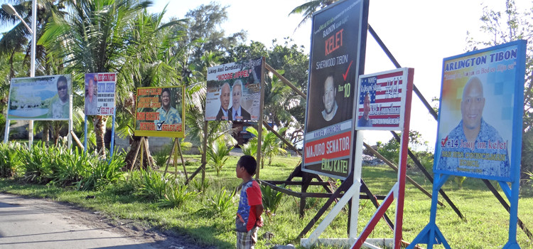 The Alwal, Rita area is a designated campaign sign area where candidates from council to senator are promoting their messages and photos. Photo: Hilary Hosia. Kwajalein is key battleground