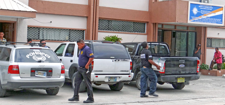 Police move postal absentee votes from the Electoral Administration office at the Ministry of Internal Affairs to a police pickup for delivery to the ICC election tabulation headquarters Wednesday November 25. The deadline for receipt of postal ballots is Monday November 30. Photo: Hilary Hosia. Younger candidates take vote lead