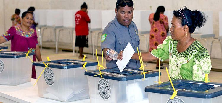 An Ebeye voter casts her ballot at the Ebeye community center on November 16 as a police officer watches. Voting can be seen taking place in the background. US Army photo by Jordan Vincent. Final, Unofficial Election Results