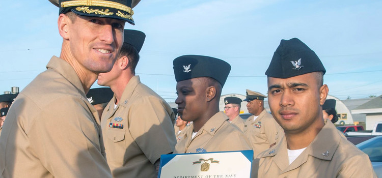 Jefferson Bobo receives the Navy Achievement Award. Bobo bats 1000