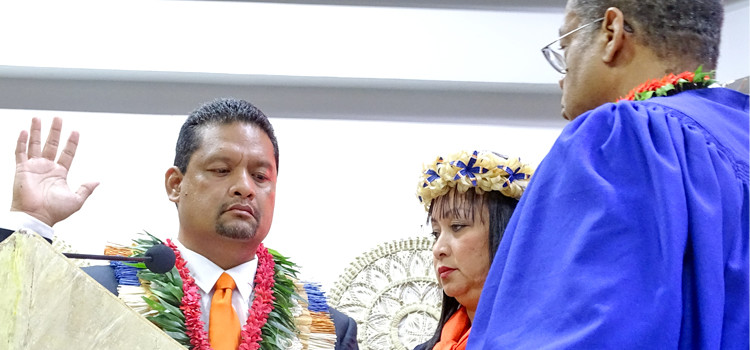 Newly-elected President Casten Nemra was sworn in by Chief Justice Carl IUngram as First Lady Terry Nemra looks on. Photo: Hilary Hosia. President highlights big issues