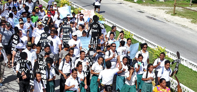 Hundreds of students and other local residents turned out for a march to mark the 62nd anniversary of the Bravo hydrogen bomb test at Bikini Atoll. The march segued into an official commemoration ceremony with speeches by President Heine, US Ambassador Tom Armbruster, and nuclear survivors. Photo: Hilary Hosia. Reviving nuclear claims