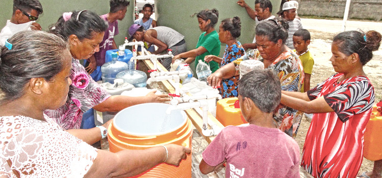 Public Works in Majuro established fresh water “filling stations” around the atoll to help people access water during the extended drought. Majuro Atoll Local Government is delivering reverse osmosis-produced drinking water from the College of the Marshall Islands to these filling stations, like this one shown in the Jenrok area. Photo: Isaac Marty. Drought continues unabated