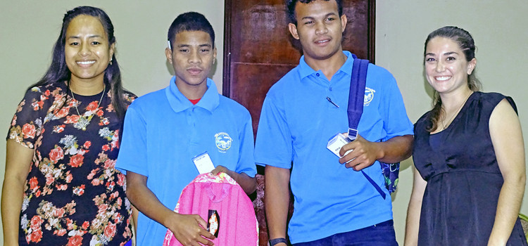 Laura High School champs Azim Bungitak and Joshua Cimble with debate coordinators Danity Laukon and Erin Gerard. Photo: Hilary Hosia. Laura beats Kwajalein