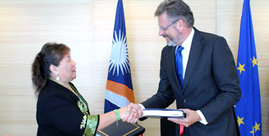 RMI UN Ambassador Amatlain Kabua (left) with European Union Ambassador Roderick Van Schreven following the visa deal signing. EU visa deal helps RMI