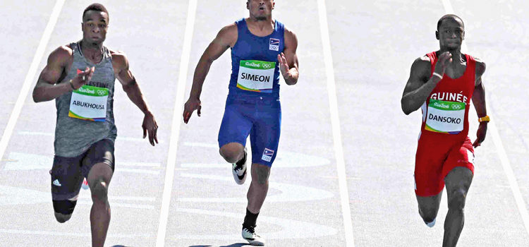 RMI sprinter Richson Simeon, center, competes with a runner from Palestine (left) and Guinea in a 100m preliminary heat at the Olympic Games in Rio. Richson’s Olympic dream run