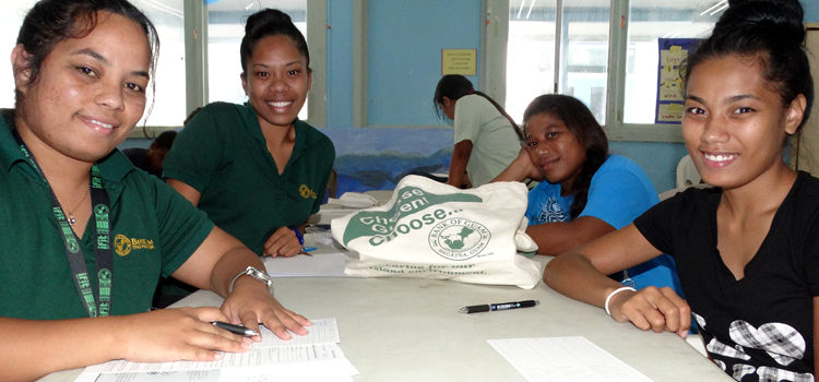 Bank of Guam staff Maria Jetton and Gabriella Hitchfield helped out Nira Kurn and Hemrita deBrum who were among 300 opening new accounts with BOG. Photo: Isaac Marty. New era opens for CMI
