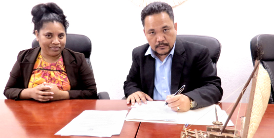 Speaker Kenneth Kedi was joined by Clerk Morean Watak in signing the minimum wage and three other Nitijela bills into law earlier this week. Wage hike signed into law