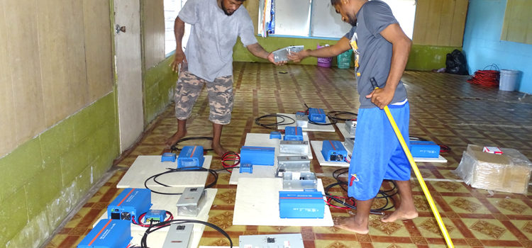 The final stage of solar installations in Majuro through a joint Humanity First-Rongelap Atoll Local Government project: Domingo Mino (left) and Tom William assembled fuse boxes and inverters in Uliga Tuesday before plugging in solar systems at 10 Rongelap homes. Photo: Hilary Hosia. Rongelap homes get solar aid
