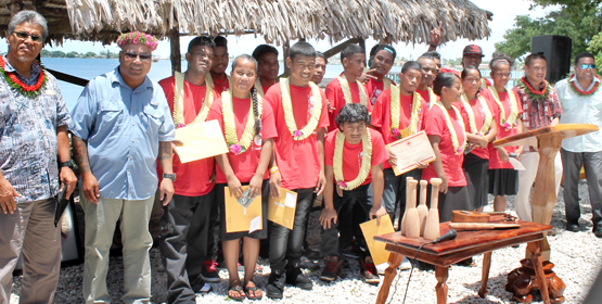 Graduates from Waan Aelon in Majel training were honored recently by National Training Council Director Allison Nashion and WAM Director Alson Kelen (to the left of the grads) and NTC Board Chairman Carlos Domnick and Marshall Islands Resort General Manager Hirobo Obeketang (at right). WAM graduates shine