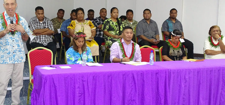 PIHOA’s Dr. Mark Durand (left) recognized the 16 Ministry of Health nurses who are launching the first-ever nurse practitioner training program in the RMI. Seated, from left: Dr. Aina Garstang, Minister Kalani Kaneko, Majuro Councilwoman Betty Tibon Imaikta, and Rev. Russell Edwards. Photo: Alson Kelen. Health’s ‘first’ for the region