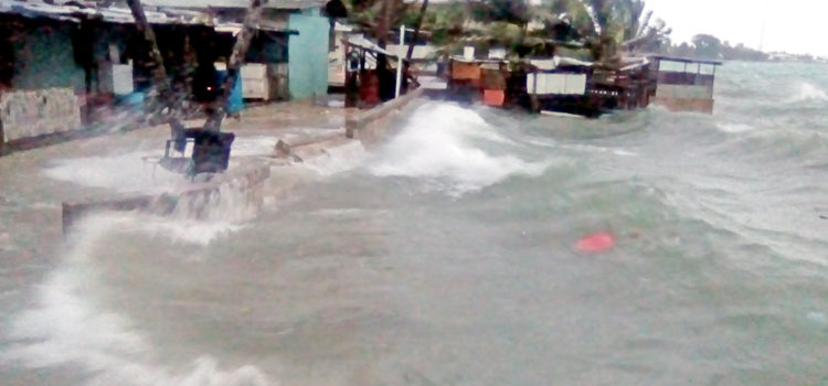 A storm-driven high tide flooded the shoreline in Uliga and Rita (pictured) as well as Ejit and other islands on Majuro’s northern coastline Tuesday afternoon, causing damage to seawalls and structures along the lagoon. Photo: Melvin Majmeto. Lagoon flooding in Majuro