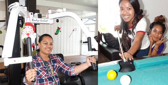 Students and staff had the chance to try out the new recreation center following the opening ceremony. CMI staff Tatiana Sawej tried out the weight equipment, while Nerita Juda lined up her pool shot with enthusiastic support from Stiffney Alik. Photos: Isaac Marty. Students: We like it!