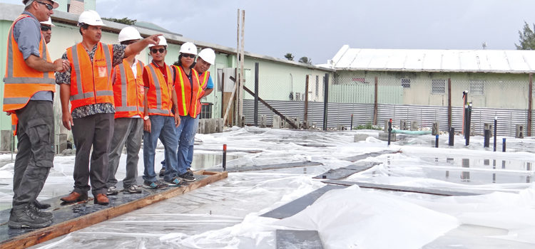Acting Public Works Minister Mike Halferty (pointing) received a briefing on progress of phase one of the new Majuro hospital from Beca supervising engineer Trevor Muddle (left) as Public Works and Pacific International officials look on. Photo: Hilary Hosia. Milestone for Majuro’s new hospital