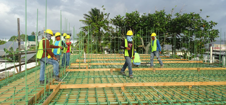 Pacific International Inc. construction workers building a new school on the former site of the Delap Head Start facility. Photo: Hilary Hosia. US-funded jobs get moving