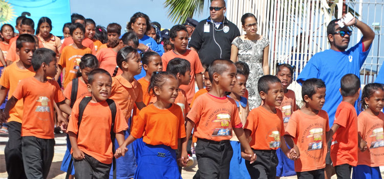 Ejit Elementary School students march in Wednesday’s Nuclear Victims Remembrance Day parade in Majuro. Ejit is one of the homes in exile for Bikini islanders. Photo: Isaac Marty. ‘Anger hasn’t faded in 71 years’