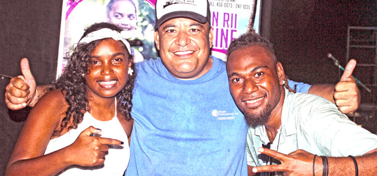 Majuro concert impresario Daniel Kramer (middle) brought popular Solomon Islands singers Rosie Delmah (left, famous for her cover of Adele’s ‘Hello’ hit song) and John Rii of the reggae band Dezine to Majuro for last weekend’s Laura beach bash. Photo: Hilary Hosia. Beach bash hits high note