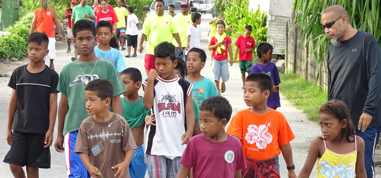 A walkathon around Jenrok was a highlight of the Red Cross-sponsored activities last Saturday in the Majuro community. Photo: Hilary Hosia Red Cross reaches out
