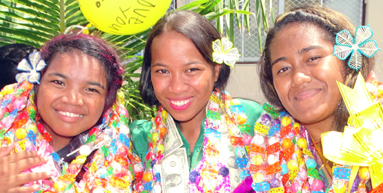 Rosie Edward, Janek Hemos and Selina Chinoska at last month’s Marshall Islands High School graduation, the largest ever in the school’s history. Photo: Isaac Marty. More girl grads in RMI