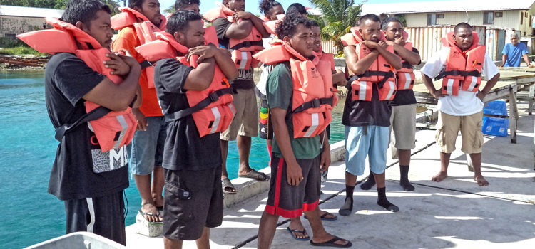 Students at the College of the Marshall Islands’ Maritime Vocational Training Center go through a life-saving drill at Uliga Dock. Photo: Edward Adiniwin. New crop of observers