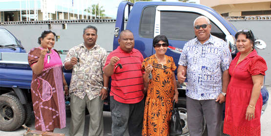 Getting their keys to the vehicles were, from left: Lomar Councilwoman Lina Amsa, Lobat Councilman Jimmy Caesar, Jeirok Councilman Jina David and Iolap Councilwoman Jouban Kabua. With them is Majuro Mayor Ladie Jack and his wife Ritok. Photo: Hansen Kaisha. Flatbeds for the Laura team