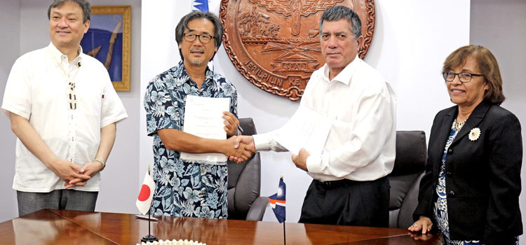Japan Vice Minister of Foreign Affairs Iwao Horii (left) joined President Hilda Heine (right) at the signing ceremony for a new Japan-funded solar project for Ebeye Island. Signing the grant pact was Japan International Cooperation Agency Resident Representative Nobuaki Matsui and Foreign Minister John Silk. Japan funds Ebeye solar plan