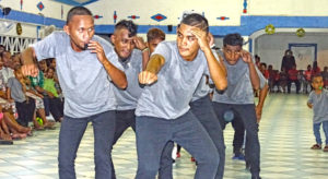 The Terong Iar jepta got down to the beat at Uliga Protestant Church Christmas Day, one of dozens of jepta to rock churches around the islands Monday. Photo: Hilary Hosia.