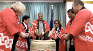 Breaking the sake container, known as kagami biraki, from left: US Ambassador Karen Stewart, Japan Ambassador Hideyuki Mitsuoka, Chief Justice Carl Ingram, Vice Speaker Jejwarick Anton and Minister David Paul. Photo: Hilary Hosia.