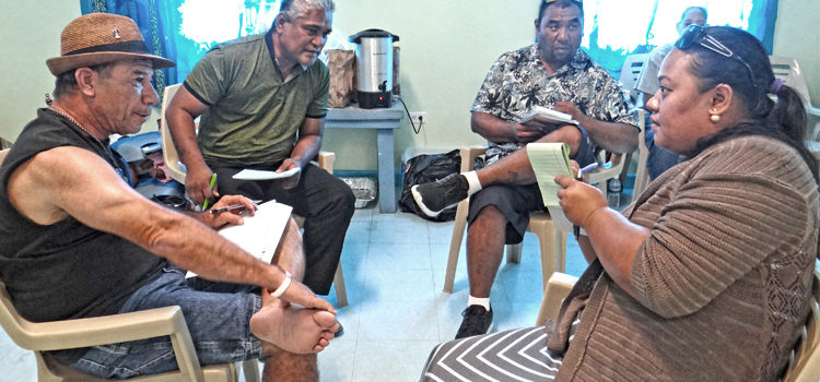 Engaged in Red Cross first aid training, from left: Rebel John, Simpson Lalej, Takuchi Shima and Ramanty Chong Gum work together through an exercise as part of their training to become first aid trainers. Photo: Hilary Hosia Red Cross builds local capacity