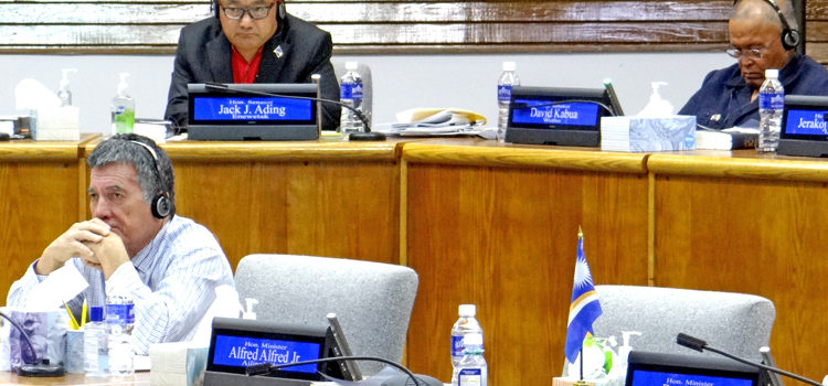Former Minister Alfred Alfred, Jr. was absent from Nitijela Wednesday when President Hilda Heine announced his resignation to the chamber. He sat next to Foreign Minister John Silk, left. Backbenchers pictured, from left: Enewetak Senator Jack Ading and Wotho Senator David Kabua. Photo: Hilary Hosia. Alfred steps down from Cabinet