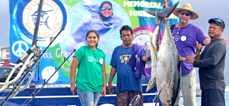 Christal deBrum was on hand to welcome back fishermen to RRE Shoreline Dock last Saturday for the MBC Miss Christa’s Memorial, including Team Jaqueline (captained by Melven Aliven, right) with their winning yellowfin tuna. Photo: Rebecca Lathrop. Ronnie wins 5th Miss Christa