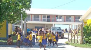 Students outside the Delap Elementary School campus in Majuro. Former DES and Rita Elementary Principal Baldwin Robert is taking on supervision of a big school improvement program for the Public School System.