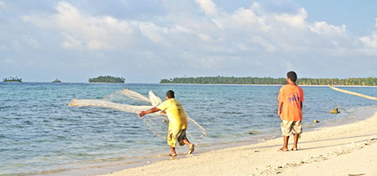 A fisherman on Lae Atoll uses a throw net to catch food for his family. MIMRA aims to ramp up its Coastal Division program focused on the outer islands. Photo: Benedict Yamamura. ‘Year for Coastal: 2018’