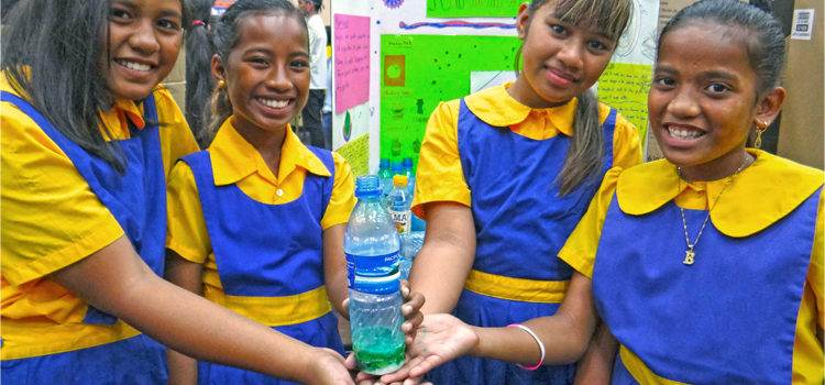 Delap Elementary School fifth graders, from left, Pearlina Jack, Christy Anien, Mina Brian and Joselyn Lautrok during the Education Week science fair at the International Conference Center. Photo: Hilary Hosia Fair showcases student knowledge