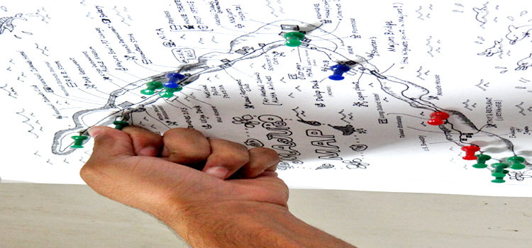A Journal employee adds another thumbtack onto a chart that shows the location of suicides in Majuro over the past three years. Calm before the storm?