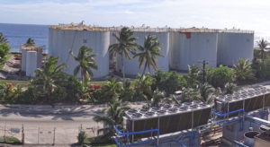 The eight tank MEC fuel farm at Delap, and the power plants in the foreground. Photo: Hilary Hosia.