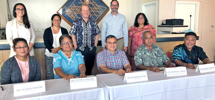 RMI officials got together to sign an agreement following a meeting to sort out details for improving drawdown and use of federal funding. RMI aims to fix spending issues