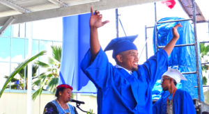 College of the Marshall Islands graduate Thurston Loeak celebrates after receiving his diploma at the May 31 graduation ceremony. Photo: Hilary Hosia.