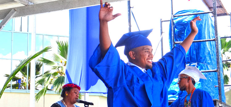 College of the Marshall Islands graduate Thurston Loeak celebrates after receiving his diploma at the May 31 graduation ceremony. Photo: Hilary Hosia. RMI sees big and small graduations