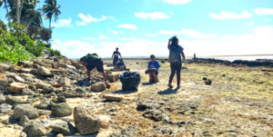 Students making a clean sweep of the Uliga waterfront generated $34.75 in recyclable bottles and cans for one hour of work.Students making a clean sweep of the Uliga waterfront generated $34.75 in recyclable bottles and cans for one hour of work.