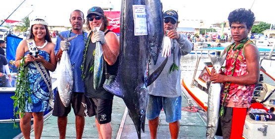 Team Dragon, captained by Rudy Aliven (standing next to marlin, right), “caught five” fish species to win the Catch Five carry over prize from a previous tournament during Friday’s first day of fishing in the 36th annual Marshalls Billfish Club July tournament. Photo: Hilary Hosia. Ladie, Baron, Rudy win
