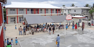 The North Delap Elementary School, which has three two-story classroom buildings and a small sports court. Photo: Hilary Hosia