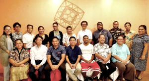 Japan and RMI officials recognized three Marshallese selected for a Japan master’s degree program, from left (in center): Benedict Yamamura, Vladimir Gulfan and Peter Robert. Photo: Kelly Lorennij.