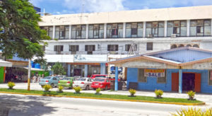 A view of the former Eastern Gateway Hotel across from Nitijela and the RMI capital building in Majuro. Nauru’s Eigigu Corporation is contesting numerous subleases on the property. Photo: Hilary Hosia.