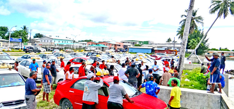 Dozens of taxi drivers met Tuesday at Delap Park to approve a fare increase. Hilary Hosia. Taxi fare hike stirs worry