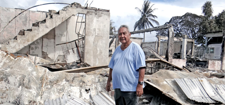 DAR founder Charles Domnick stands outside the former Israeli Consulate office, part of the fire-destroyed DAR complex. Photo: Hilary Hosia. DAR suffers major fire