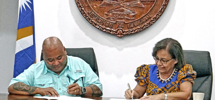MICNGOs President Alson Kelen, left, and RMI President Hilda Heine signed the first-ever Partnership Framework Agreement for civil society last week in Majuro. Photo: Hilary Hosia. RMI boosts NGO support