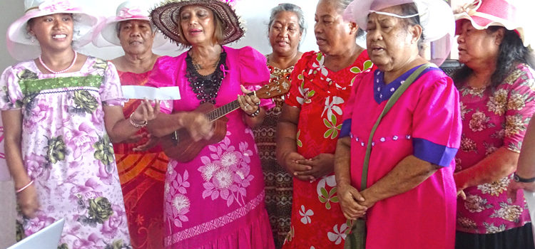 Nika Wase (playing ukulele) led a cancer survivor group in song at last week’s Breast Cancer Awareness Pink Tea Party at Marshall Islands Resort. Photo: Kelly Lorennij. Pink party promotes cancer action